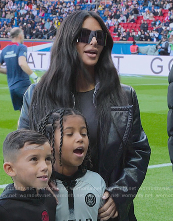 Kim's black leather coat on The Kardashians