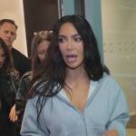 Kim’s light gray hoodie and leggings on The Kardashians