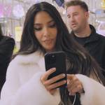 Kim’s white fur coat on The Kardashians