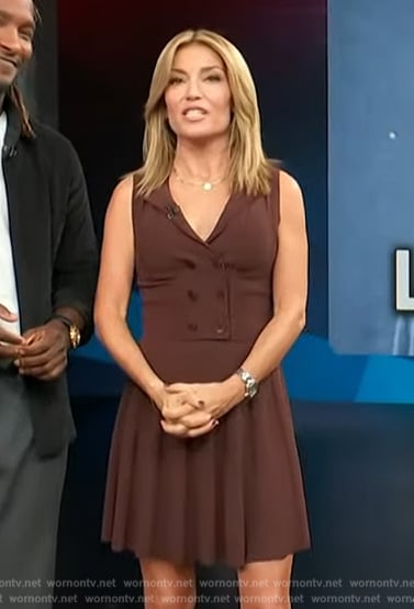 Kit’s brown vest and mini skirt on Access Hollywood