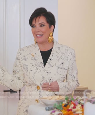 Kris's printed blazer and earrings on The Kardashians