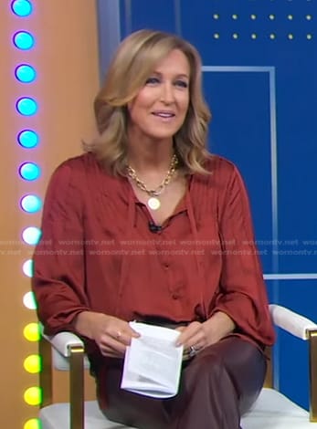 Lara’s brown tie neck blouse on Good Morning America