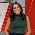Lilia Luciano’s green sleeveless turtleneck and plaid skirt on CBS Mornings