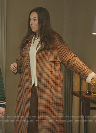 Maria's orange gingham check trench coat on Elite