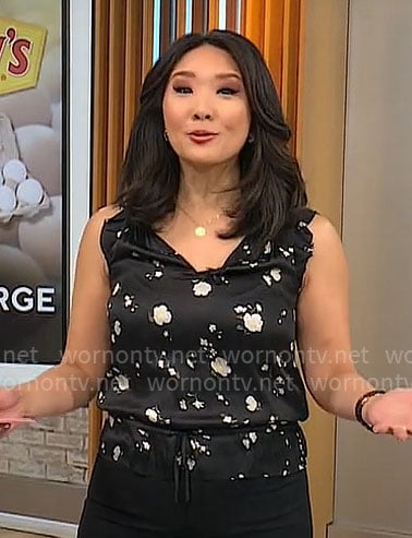 Nancy Chen's black floral v-neck top on CBS Mornings