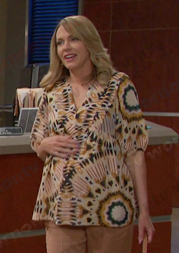 Nicole's yellow tie dye top on Days of our Lives
