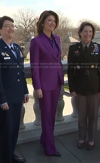 Norah’s purple tie neck blouse and suit on CBS Evening News