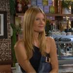 Phyllis’s navy blue one-shoulder dress on The Young and the Restless