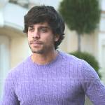 Raul’s purple cable kit sweater on Elite