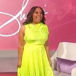 Sherri’s lime green top and asymmetric skirt on Sherri