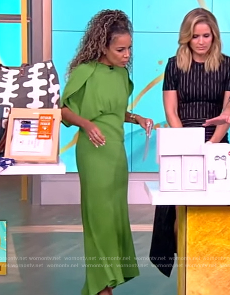 Sunny’s green gathered shoulder dress on The View