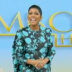 Tamron’s black and blue floral print mini dress on Tamron Hall Show