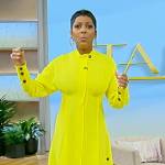 Tamron’s yellow button detail dress on Tamron Hall Show