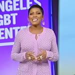 Tamron’s purple embellished cardigan and skirt on Tamron Hall Show