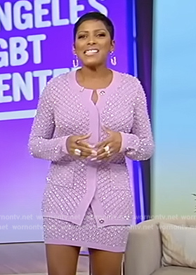 Tamron’s purple embellished cardigan and skirt on Tamron Hall Show