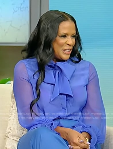 Tonesa Welch’s blue sheer tie neck blouse on Tamron Hall Show