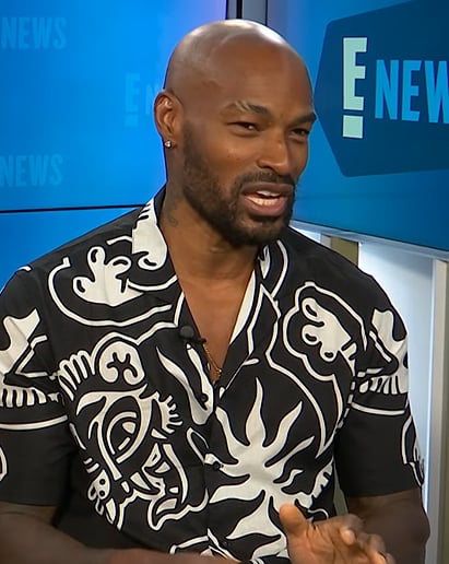 Tyson Beckford's black printed shirt on E! News