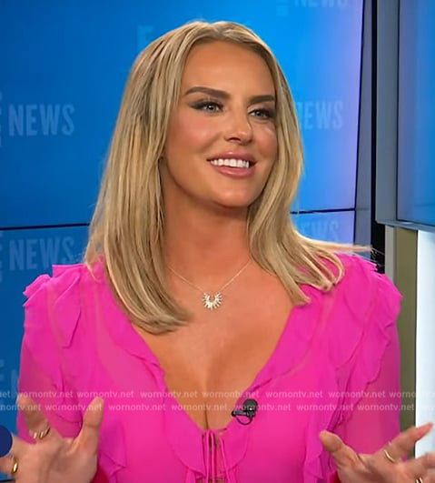 Whitney Rose’s pink ruffle blouse on E! News