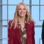 Lauralee Bell’s floral print blouse and satin blazer on The Talk