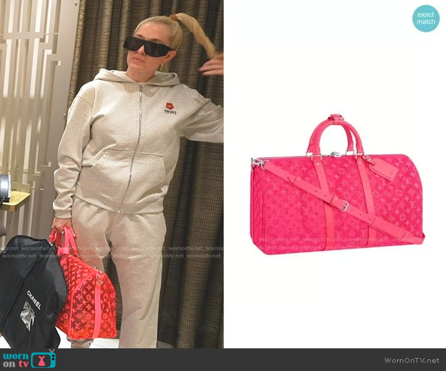 Louis Vuitton Keepall Bandouliere in Pink Mesh worn by Erika Jayne on The Real Housewives of Beverly Hills