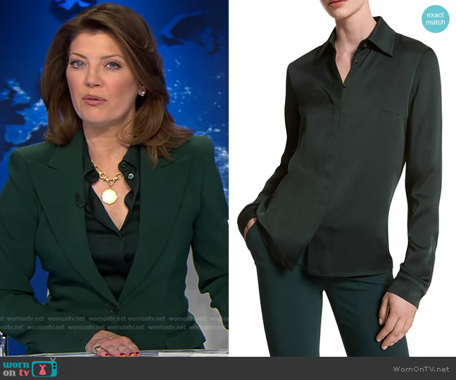 Norah’s dark green shirt on CBS Evening News
