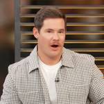 Adam Devine’s check print jacket on Access Hollywood