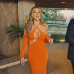 Alex Hall’s orange strappy cutout dress on Selling Sunset