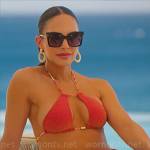 Amanza’s red metallic bikini, embellished pumps and printed pareo on Selling Sunset