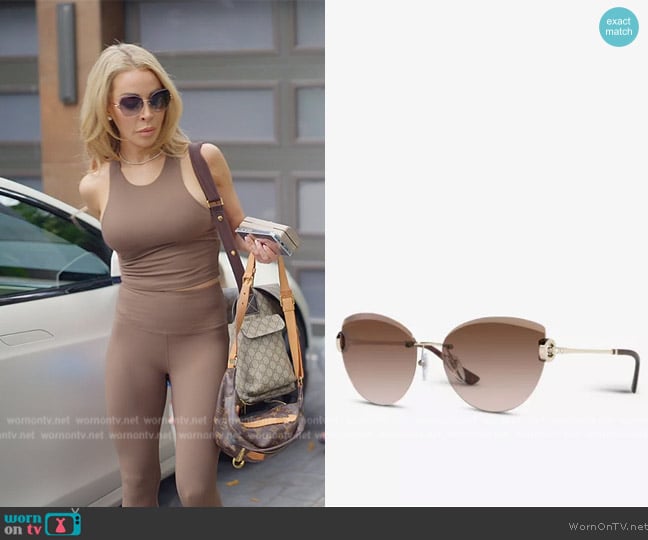 Bvlgari BV6166B cat-eye gold-tone metal sunglasses worn by Lisa Hochstein (Lisa Hochstein) on The Real Housewives of Miami