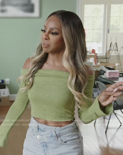 Candiace's green off shoulder sweater and jeans on The Real Housewives of Potomac