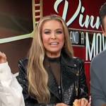 Carmen Electra’s black leather jacket and mini dress on Access Hollywood