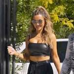 Chrishell’s black leather crop top and metallic pants on Selling Sunset