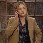 Claire’s camel coat and sheer metallic blue blouse on The Young and the Restless