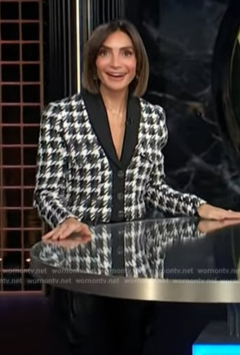 Courtney Lopez's houndstooth print jacket on E! News