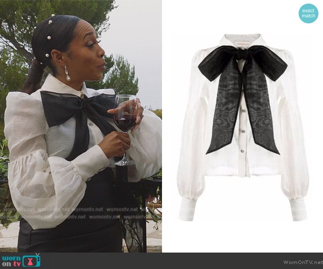 Zimmermann Dancer tie-neck blouse worn by Lola Carmichael (Simone Missick) on All Rise