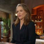 Diane’s navy wrap blouse on The Young and the Restless