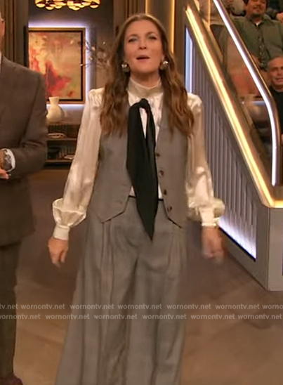 Drew's white tie neck blouse and vest on The Drew Barrymore Show