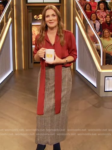 Drew’s red tie neck blouse and skirt on The Drew Barrymore Show