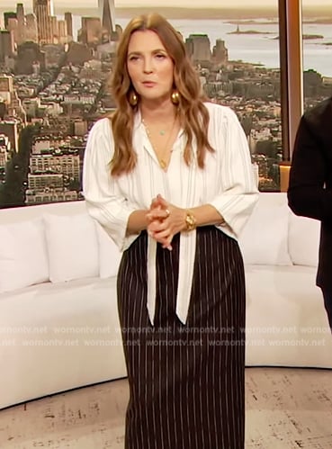 Drew’s white printed tie neck top on The Drew Barrymore Show