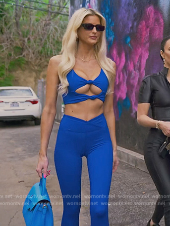 Emma's blue twist front sports bra and leggings on Selling Sunset