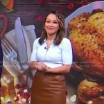 Eva’s light blue polo and brown leather skirt on Good Morning America