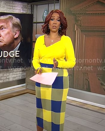 Gayle King’s yellow asymmetric sweater and blue checked skirt on CBS Mornings