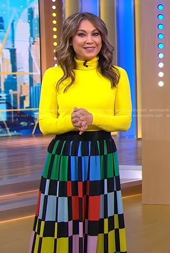 Ginger's yellow turtleneck top and geometric skirt on Good Morning America