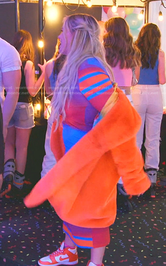 Heather's multicolor printed dress and orange fur coat on The Real Housewives of Salt Lake City