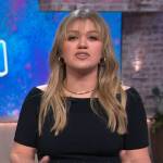 Kelly’s black off shoulder top and metallic skirt on The Kelly Clarkson Show