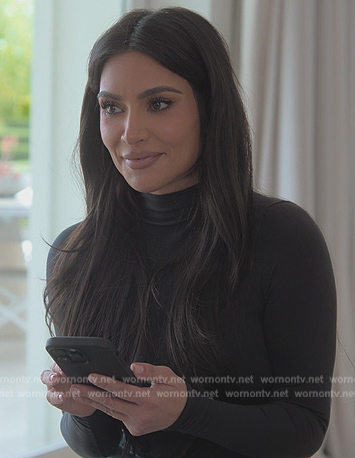 Kim's black turtleneck top on The Kardashians