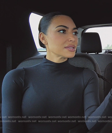 Kim's black mesh bodysuit on The Kardashians