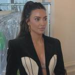 Kim’s black contrast corset blazer on The Kardashians