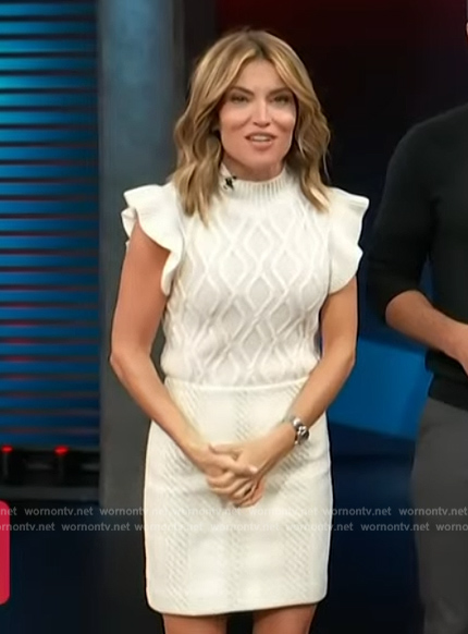 Kit's white cable knit sleeveless sweater on Access Hollywood