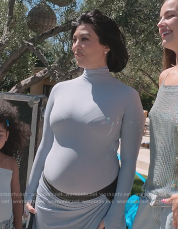 Kourtney's blue mesh top and skirt on The Kardashians